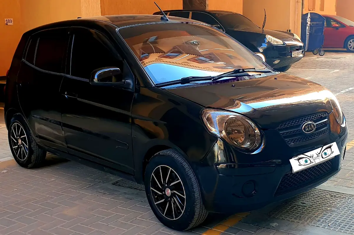 Kia Picanto 2011 — photo 1 of 9