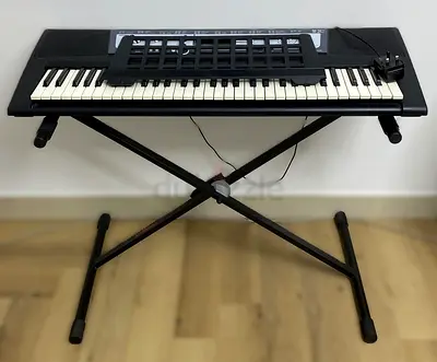 Yamaha PSR-E213 Portable 61-Key Keyboard with Stand