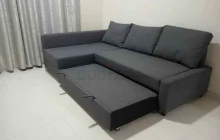 Grey L-shaped  Sofa Bed with Storage - Good Condition