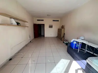 A great opportunity for annual rent in Ajman: a two-bedroom apartment with a living room in Al Nuai