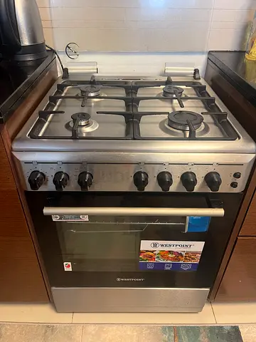 Westpoint 4-burner Gas Cooking Range with Oven — Good Working Condition