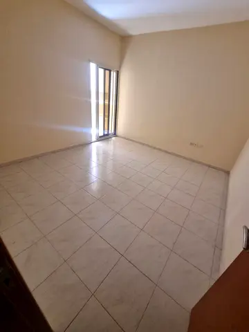 Apartment for rent in Muwaileh, 2BR + hall, master room, 3 baths, 2 balconies, central AC, spacious, prime location near services, AED 45K yearly