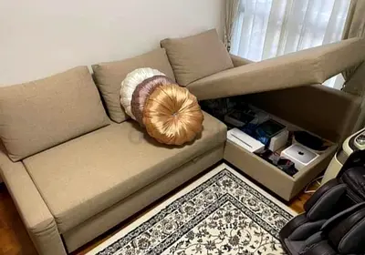 L-shaped beige storage sofa bed good condition