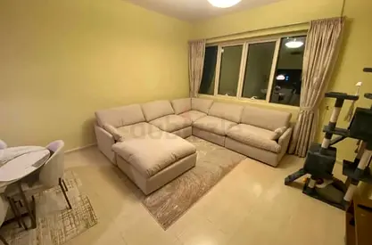 Swin feather filled modular Sofa with footstool