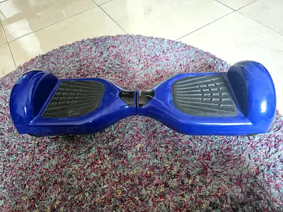 Blue self-balancing hoverboard / electric scooter board