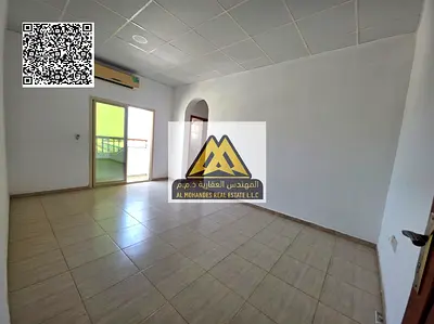 A 1-bedroom apartment with a living room for annual rent in Liwara 1 – Ajman, featuring a stunning sea view overlooking the creek and Ajman Port, with
