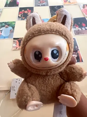 Cute vintage-style plush doll with big eyes, pre-loved