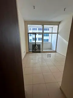 Two bedrooms and a living room in Ajman, with a swimming pool, gym, and two free parking spaces.