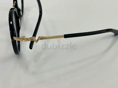 Black round frame eyeglasses with gold temples (pre-owned)