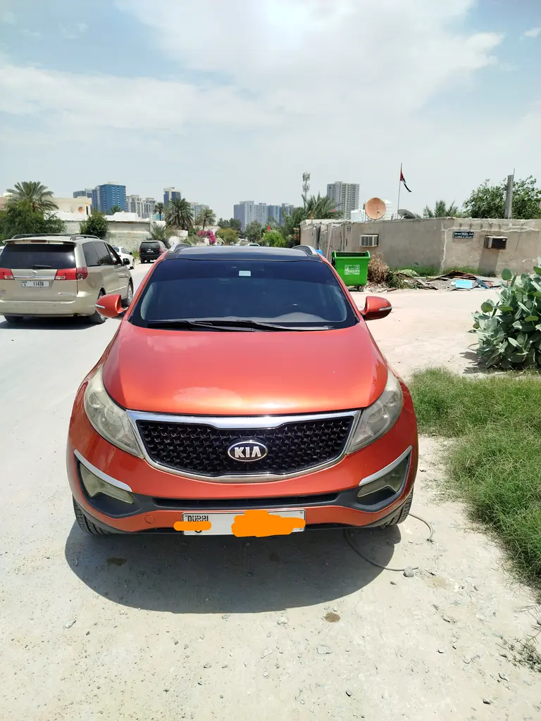 Kia Sportage 2014 — photo 1 of 9