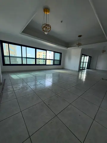 Two bedrooms and a living room in Al Majaz 2 with multiple amenities, a sea view, and a great price in the most beautiful area of ​​Sharjah.