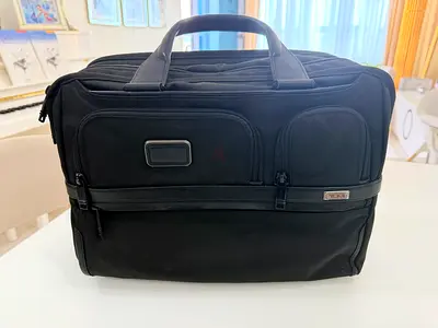 Tumi black travel backpack — good used condition