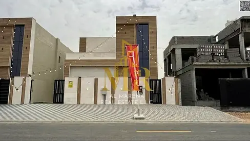 Two-story villa with a rooftop terrace, central air conditioning, freehold ownership for all nationalities, very close to Umm Al Quwain University, at