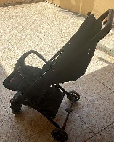 Nurtur black foldable Baby stroller  ( AED 299 )