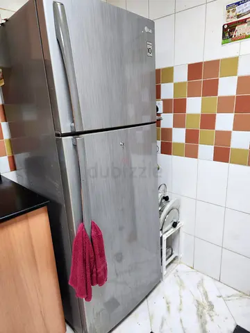 LG Stainless Steel Top Freezer Refrigerator - Good Working Condition