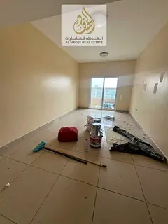 Two bedrooms and a living room for annual rent with built-in wardrobes, central gas, and parking ins