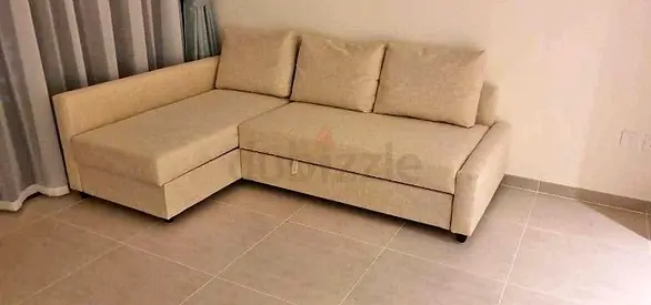 Beige L-shaped Sofa bed with Chaise (Good Condition)
