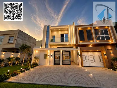 Villa for sale, including registration and ownership fees, with monthly installments starting from 5000 dirhams, on a main street, in a very prime loc
