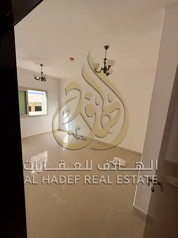 For annual rent, a one-bedroom apartment in Al Taawun, close to shopping centers and services, with quick access to Dubai exit and convenient payment