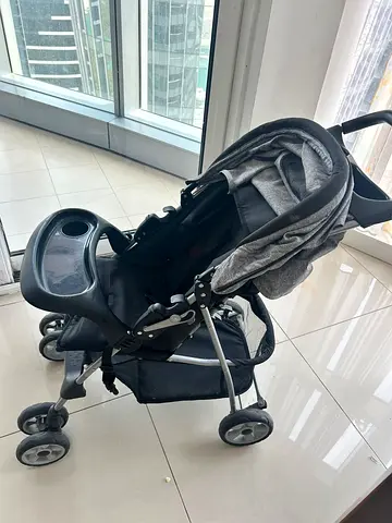 Lightly Used Gray Baby Stroller with Canopy and Snack Tray