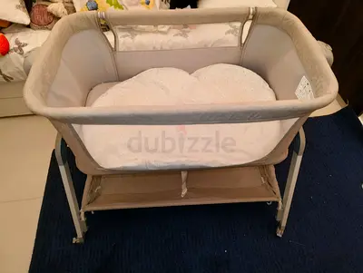 Giggles next to me like new with mattress only 150 aed