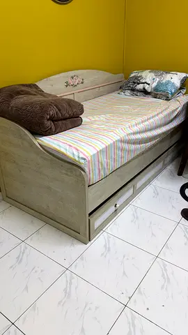 Single wooden bed with under-bed drawers, good condition