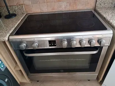 Hoover used stainless steel electric ceramic hob with built-in oven - good working condition 90x60