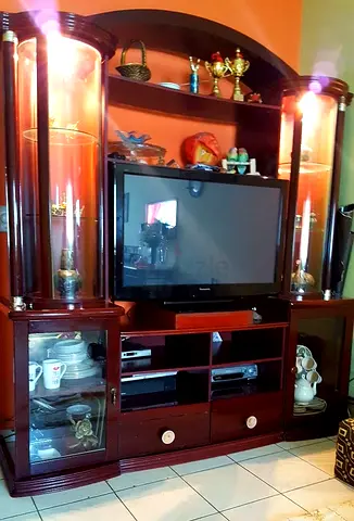Dark Wood Entertainment Center with Glass Display Cabinets and lights