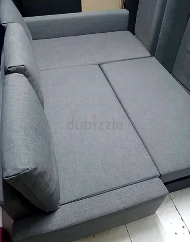 Grey Fabric L-Shaped Sofa Bed –Converts to Bed, Good Condition