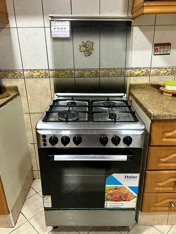 Haier 4-Burner Gas Stove with Oven — Good Working Condition