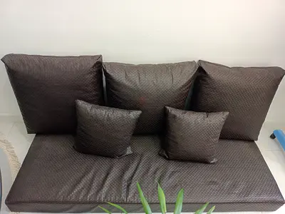 Small two-seater sofa seat with cushions - dark brown