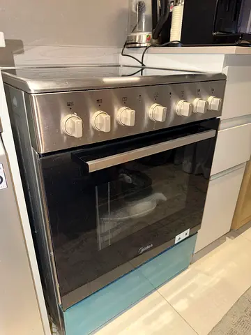 Midea Freestanding Cooker with Oven - Stainless Steel