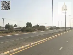 Residential/commercial land for sale in Manama 9 | First plot from the main road and close to Al-Suw