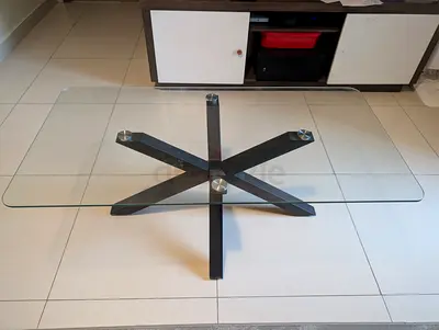 Modern Glass Coffee Table with Black Spider base.