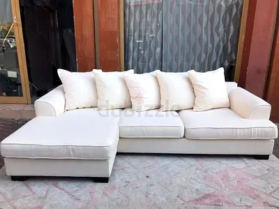The One Kingston L shape sofa beigCream L-shaped Fabric Sofa with Ottoman — 4-Seater, Good Condition