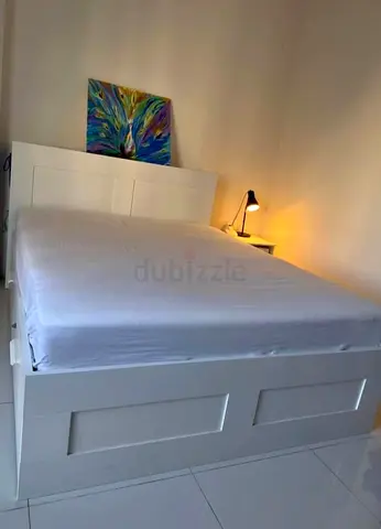 IKEA brimness queen size bed with 4 storage drawers underneath and with IKEA mattress