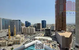 Two-bedroom apartment with a living room, closed kitchen, and city view. Cash only.