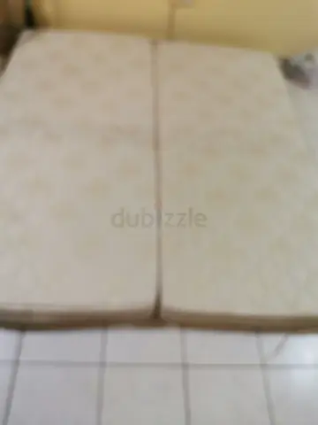 Two Single Mattresses - Good Condition