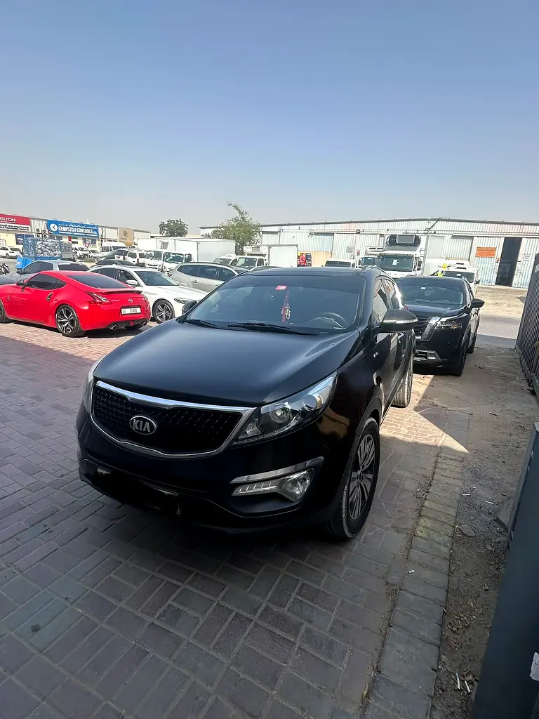 Kia Sportage 2015 — photo 1 of 15