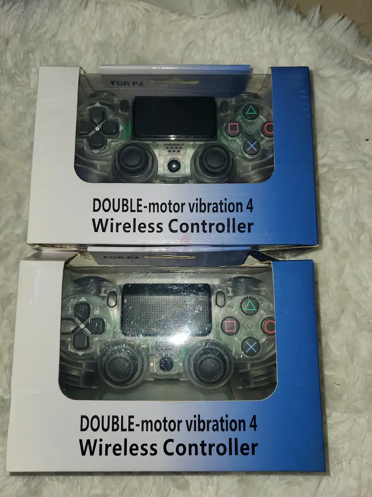 2pcs Wireless Controllers for PS4 (Double Motor Vibration) - New in Box |  dubizzle Dubai