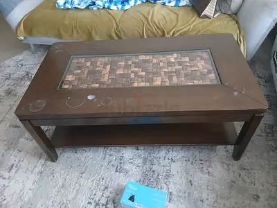 Wooden coffee table with mosaic inlay and lower shelf - used