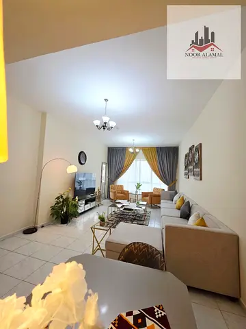 Sharjah, Al Taawun area, spacious furnished apartment with hotel-style furniture, first occupancy. Three bedrooms, maid's room, living room, kitchen,