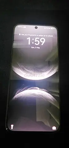 Used smartphone with full-screen display (no visible branding) - good condition, only 4 month used..