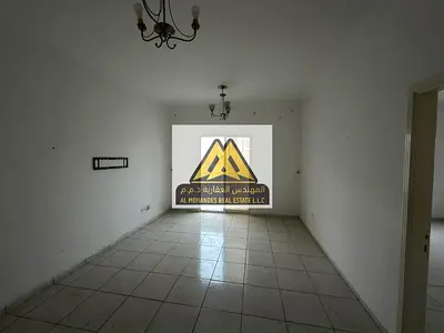 Prime Location on King Faisal St. – Spacious 1BR Apartment for Rent in Al Nuaimia 2 Central A/C, Built-in Wardrobes & Balcony Directly on the Main