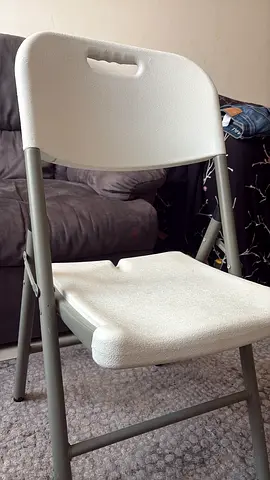 White Folding Plastic Chair with Metal frame have 4 1 is for 50 if u buy all 4 I can do discount