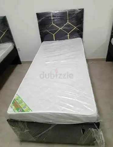 Single bed frame with mattress — like new, still wrapped