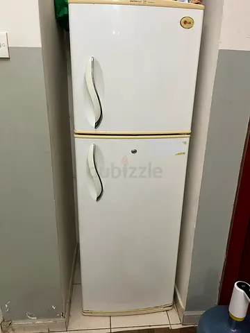 Used double-door refrigerator/freezer - good working condition-LG Brand-only 200