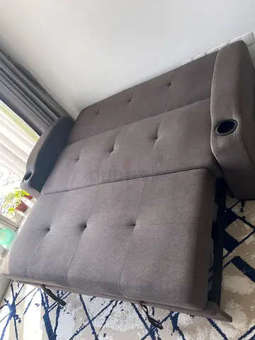 Grey Fabric Sofa Bed with Cup Holders — 189 x 155 cm