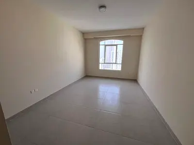 Apartment for rent in Ajman Corniche, first occupancy, one bedroom and living room, 2 bathrooms, ma
