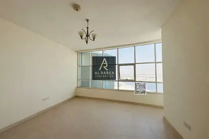 For annual rent in Ajman, in the Orient Towers: rooms, a living room, and 2 bathrooms; spacious areas.